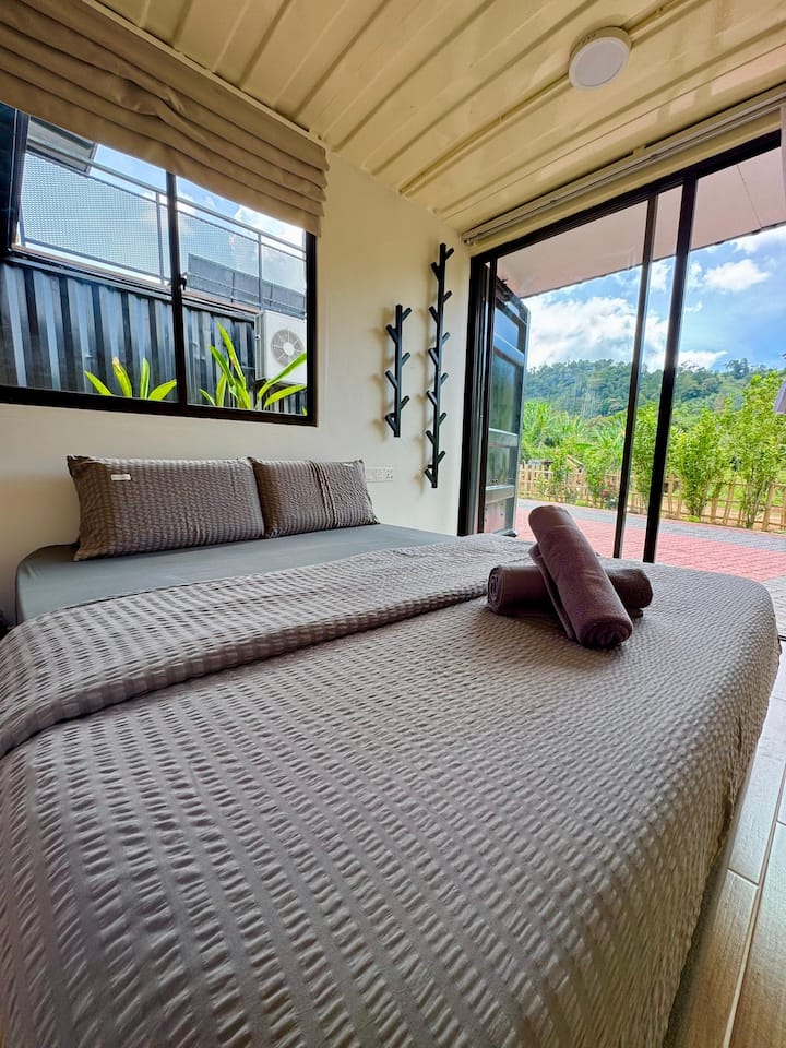 Third Bedroom is a stand alone cabin located on ground floor comes with a queen sized bed and ensuite bathroom able to accommodate 2 pax. One mattress can be added at RM80 per set
