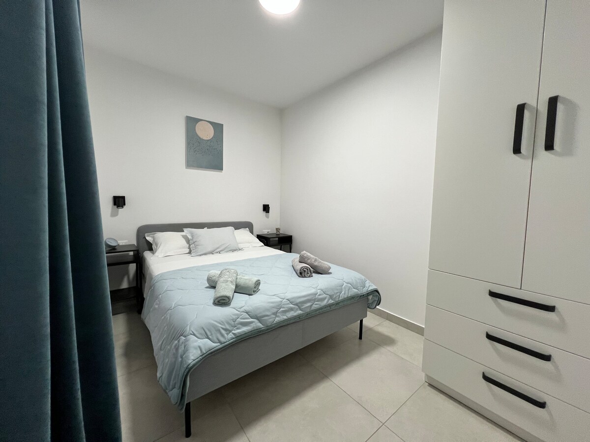 Bedroom 2 image 4 at Apartment Festini – Spacious apartment in central Pag in Pag