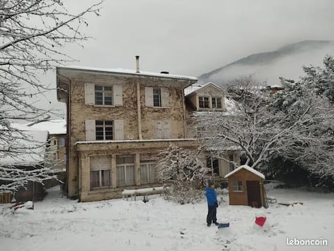 Large house in the center of the village and close to the station