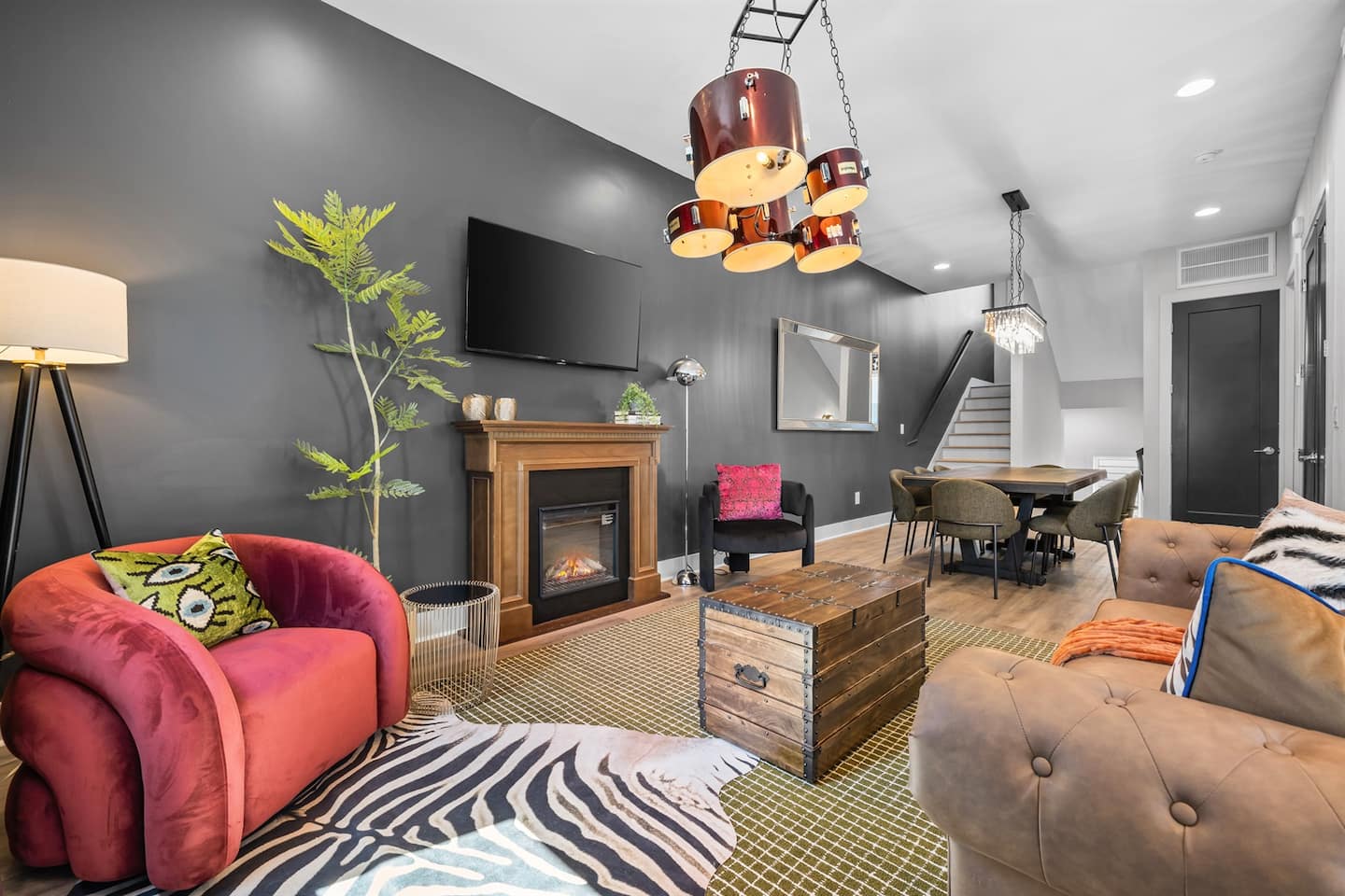 Designer living room with fireplace and bold decor