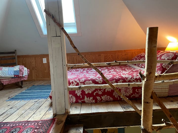 Attic loft space with floor mattress and sky light. No door to this space. 