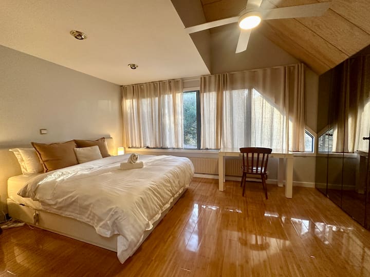 Main ensuite bedroom with king size bed