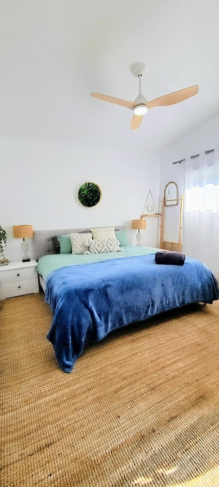 King suite overlooking garden. Tucked away from the other two bedrooms. Private entrance to balcony, surrounded by greenery. Home Office set up with wide screen and Wi-Fi. 