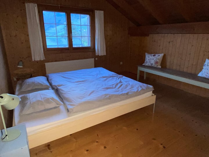 * QUEEN BED (160x200cm)
* WARDROBE 
* Mosquito net WINDOW and views of pastures and mountains
* Space for a COT