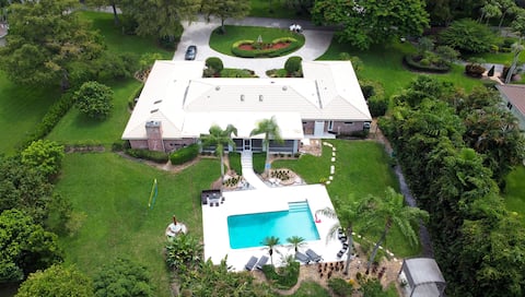 Upscale Waterfront Mansion: Pool, Kayak, Game Room