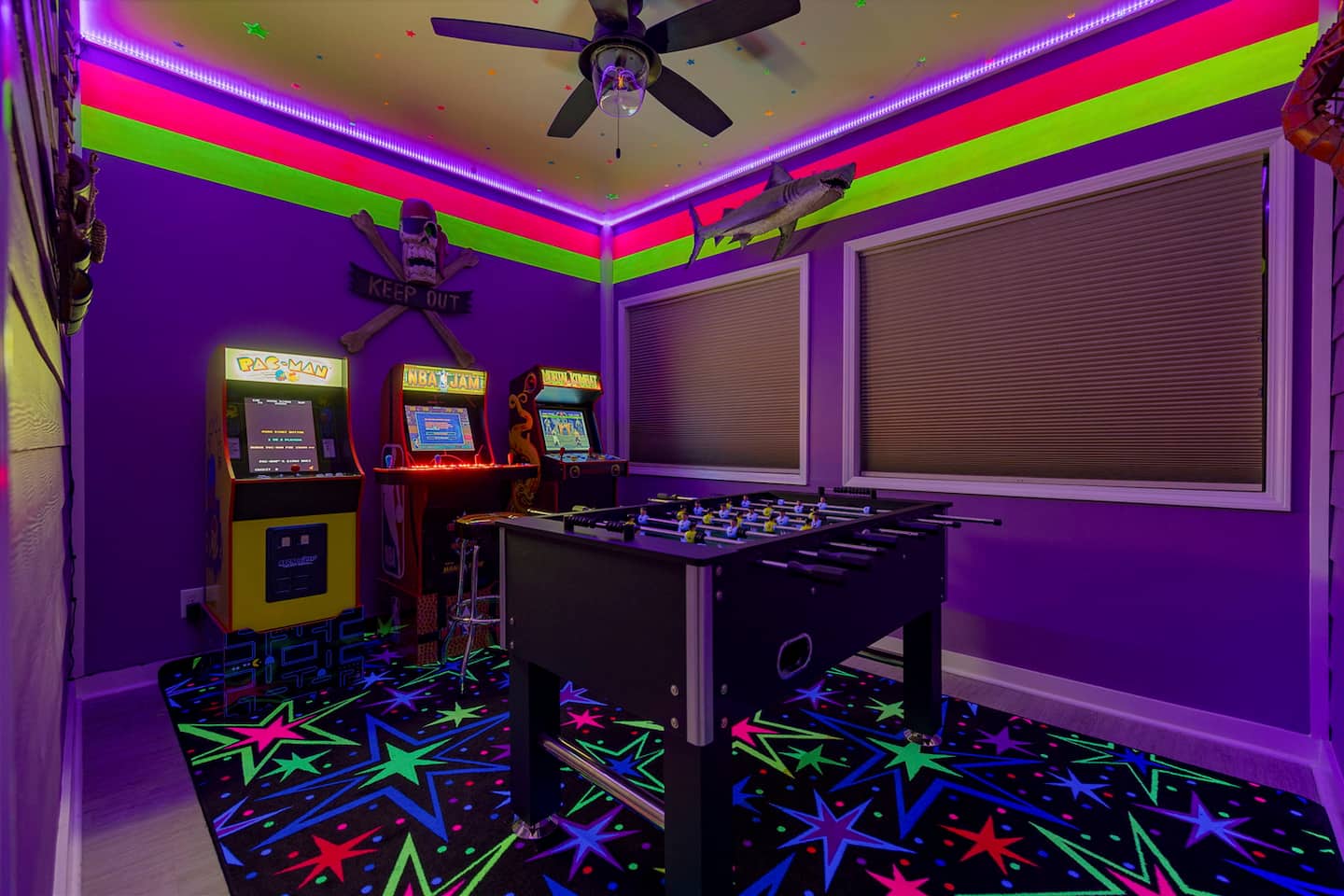 Step into the arcade room and let the arguments begin: PacMan, NBA Jam, Mortal Kombat, foosball, and neon lights that make every age feel twelve.