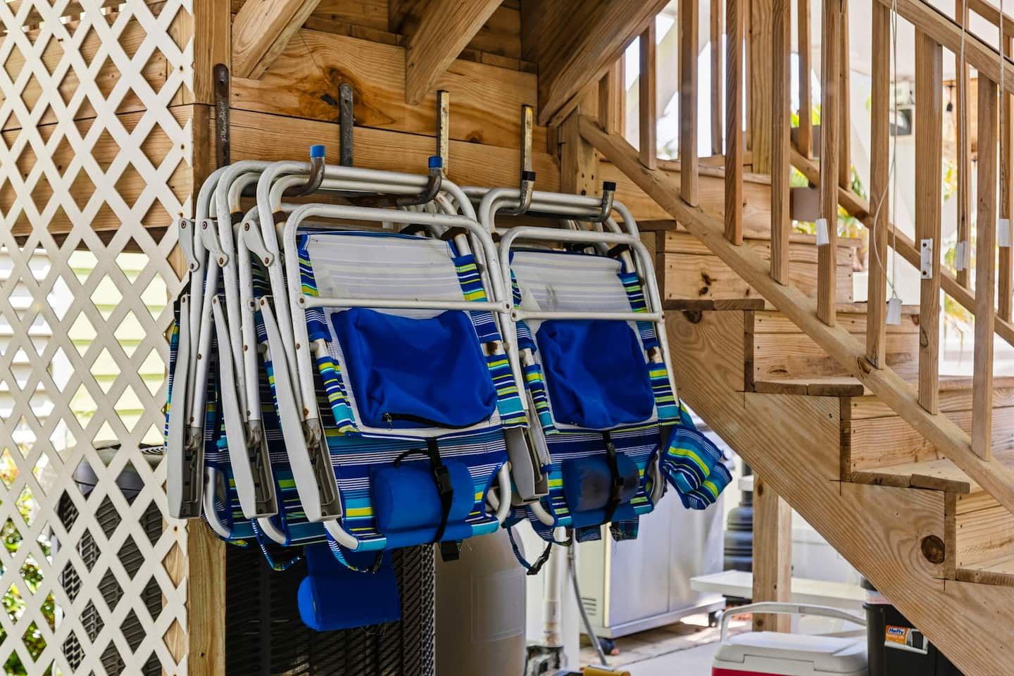 Grab beach chairs right from the hooks under the staircase. Already there, so you don't have to pack them or wrestle with car roof racks.