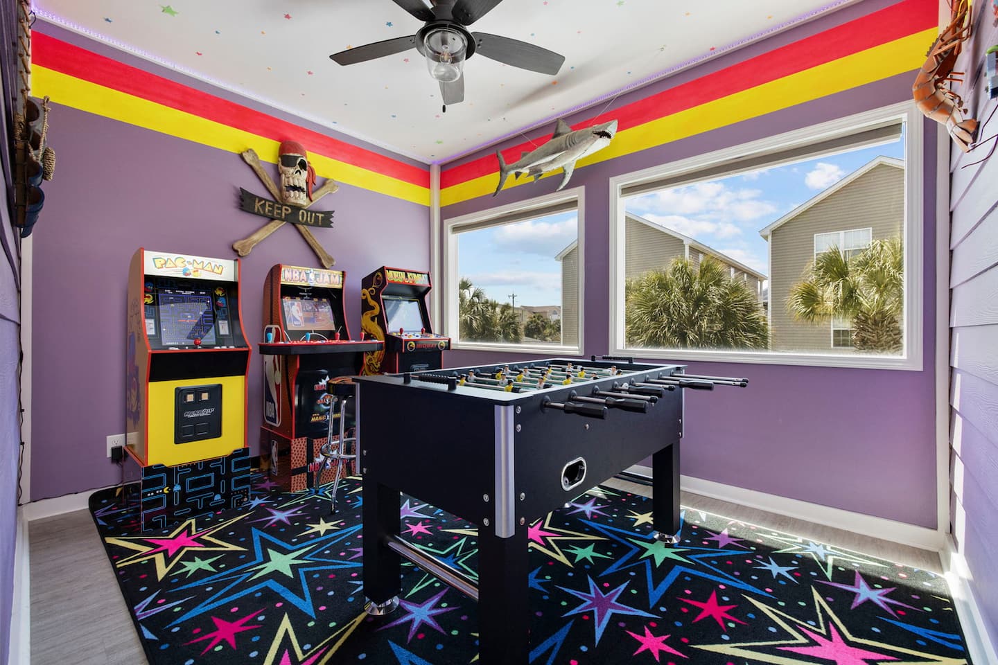 Lose a few hours in the neon-lit arcade: rainbow lights above, star-pattern carpet underfoot, and gaming machines that no one walks past without stopping.