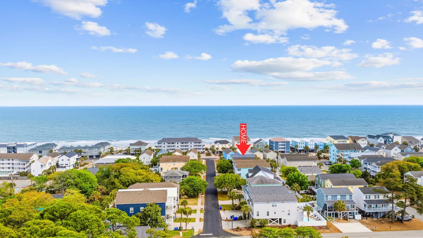 Your new neighborhood from above. Ocean in one direction, restaurants and the pier in the other, and you can see exactly how close everything is.
