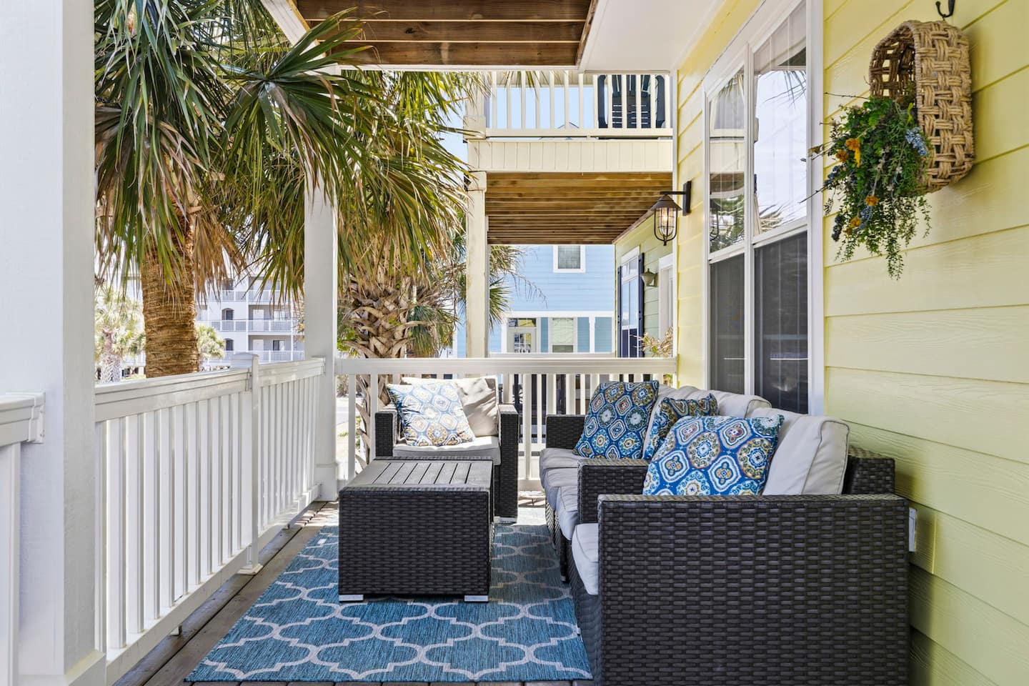 Spread out on the covered front porch sectional. Big enough for the whole crew to catch the evening breeze without fighting over who sits where.