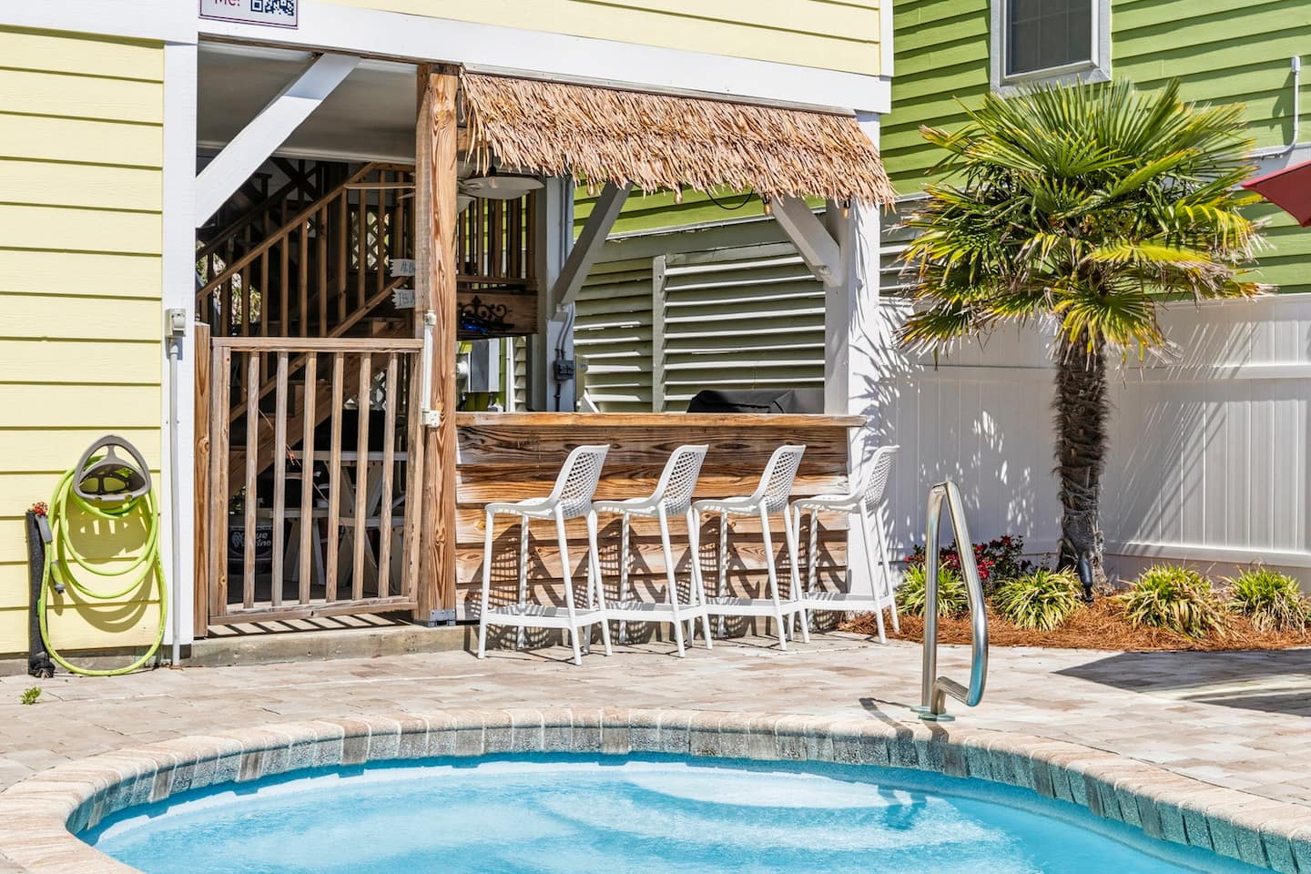 Pull up a stool at the tiki bar and hand the bartending duties to whoever lost at foosball. Thatched palm roof, reclaimed wood counter, pool at your back.