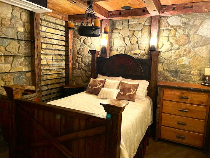 Queen size bed downstairs.