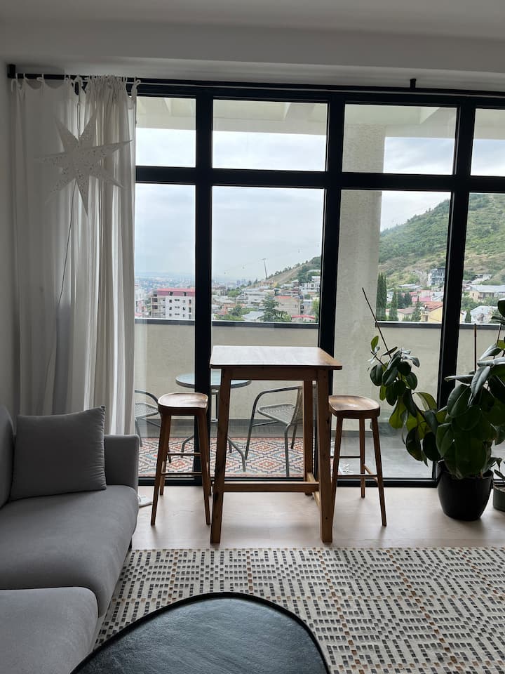 Workspace evidence from Stylish Studio with Scenic Mountain View in Vera