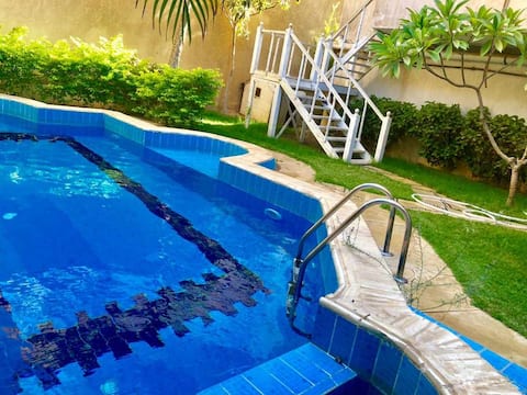 Cheerful villa with a pool and a wonderful garden