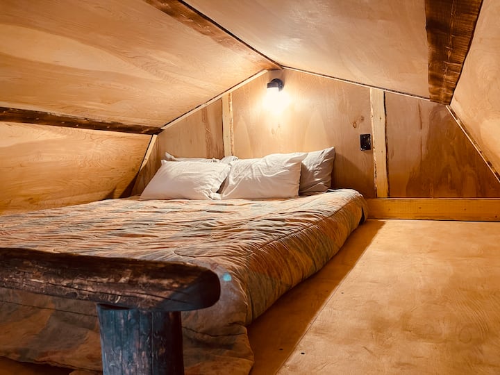 Super cozy large loft with a king size bed. 