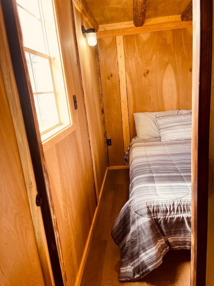 Main floor bedroom. Double bed. 