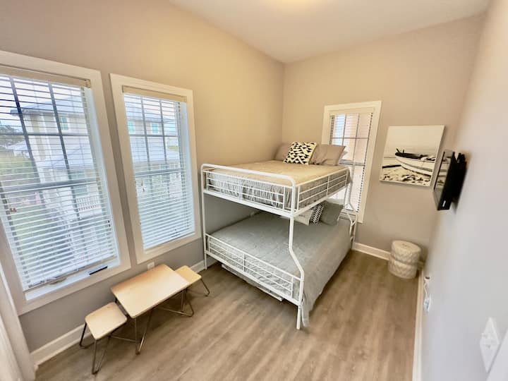 Full over Queen with trundle twin if needed. Great for the kids that want to sleep in the same room.