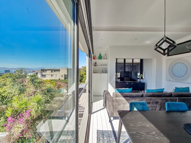 Bright, Stylish Oasis with Panoramic City Views
