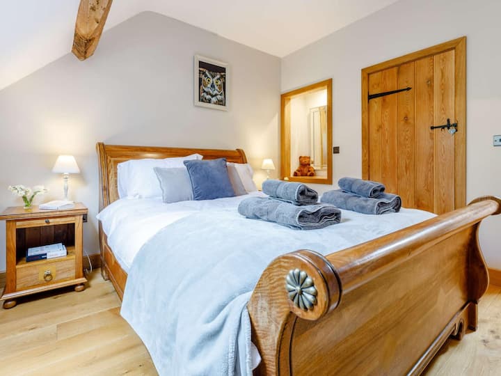 Master Bedroom, with sleigh bed, luxury Vispring mattress and built-in wardrobe