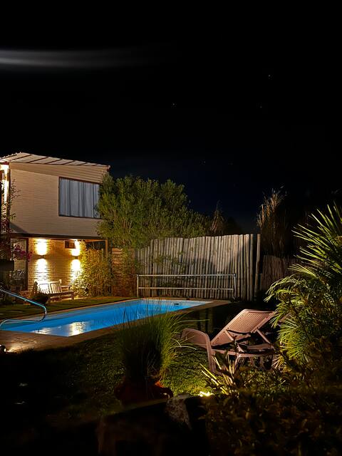Pool and beautiful green spaces.