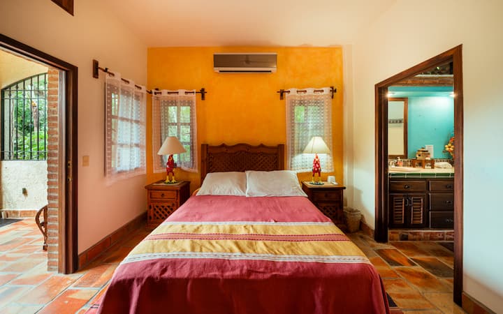 Cama principal que conduce a su propia terraza