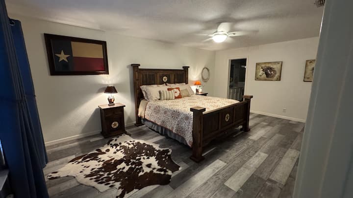 Everything in Texas is bigger.  This is our largest bedroom, we call it the Texas Room, and it is filled with Texas flare.