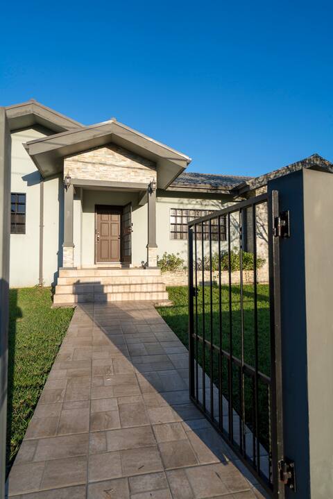 Modern home with fenced in yard