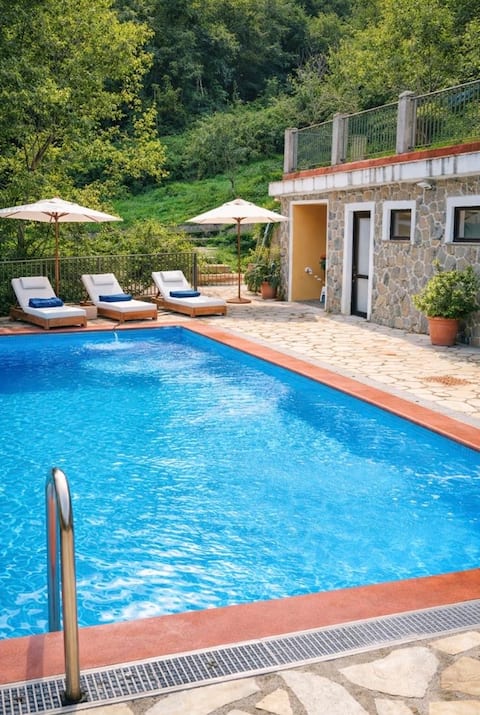 Apartment with terrace, garden, and pool