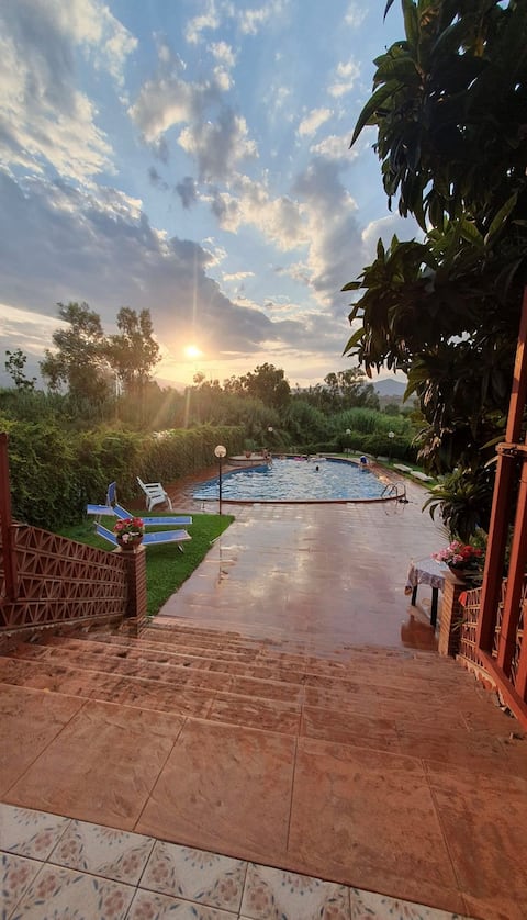 By the sea and crossed by a river!