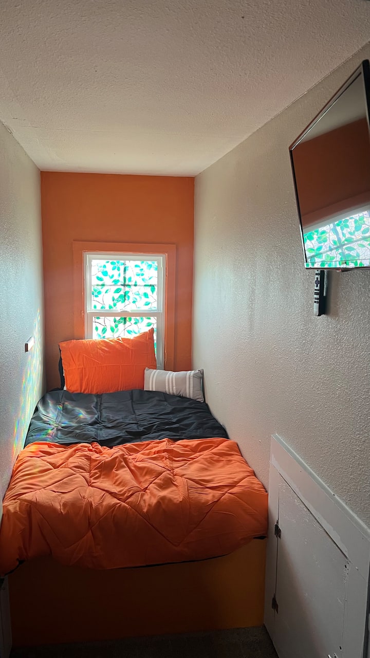 One of our new mini-twin cubbies in our upstairs game room. Each cubby has a 5.5 ft long memory foam mattress, and its own personal smart tv with Netflix and Disney Plus, a multi-colored light bar, and a curtain to close for privacy!