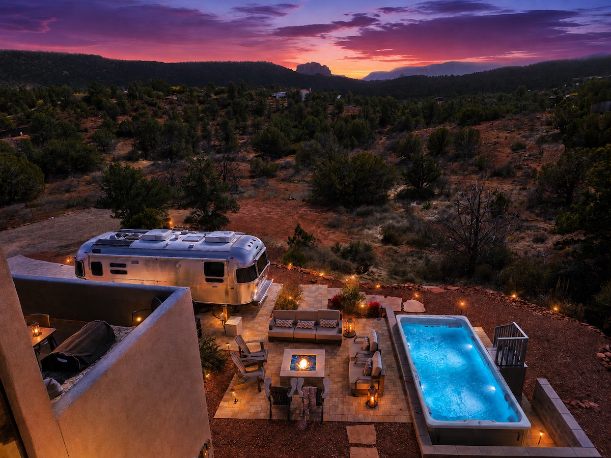 Recommended cover photo: twilight aerial showing fire pit, pool and red rocks