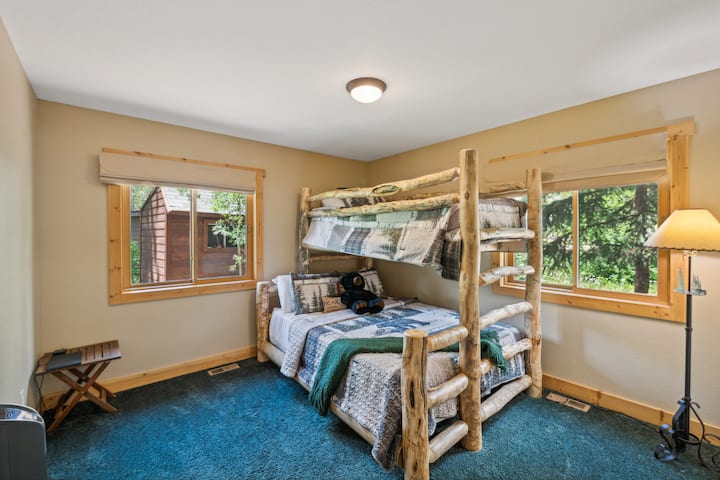 This is the bedroom on the main floor. It has a bunk bed with a queen on bottom and a full on top. Both mattresses are premium memory foam. 