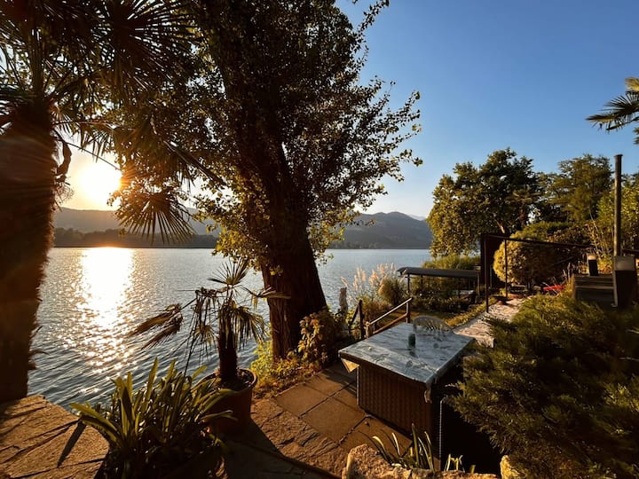 House with garden on the lake
