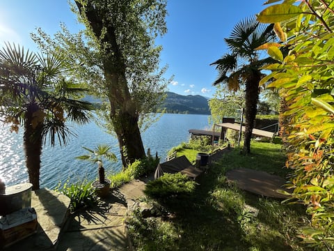 House with garden on the lake