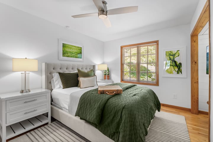 "Spring" Bedroom - Sleeps 2 in a Queen.  Wall mount smart Fire TV with alcove lighting. Ceiling fan w/remote & nightstand with integrated USB and Electric Outlets for easy plug in. Plenty of drawer storage, large closet & luggage bench. 