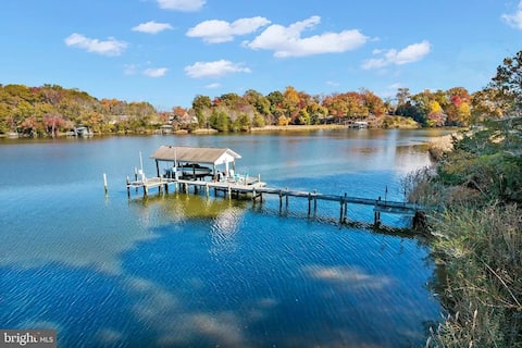 Riverfront Home w/Dock · Fire Pit · Kids Play Area