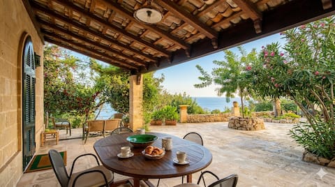 Historic residence with private terrace overlooking the sea