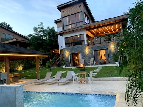 A villa with a private heated pool, billiards, and a BBQ