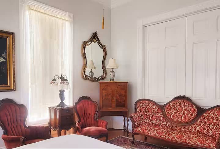 A large Master Bedroom Sitting Room double duties as a 3rd bedroom The room has it's own private entry off of the main entry hall Giant pocket doors provide privacy A queen size air mattress provides for comfortable sleeping arrangements when needed.
