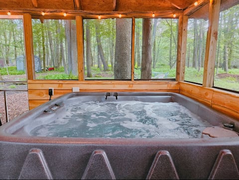 spacious tiny cabin with private hot tub by lake