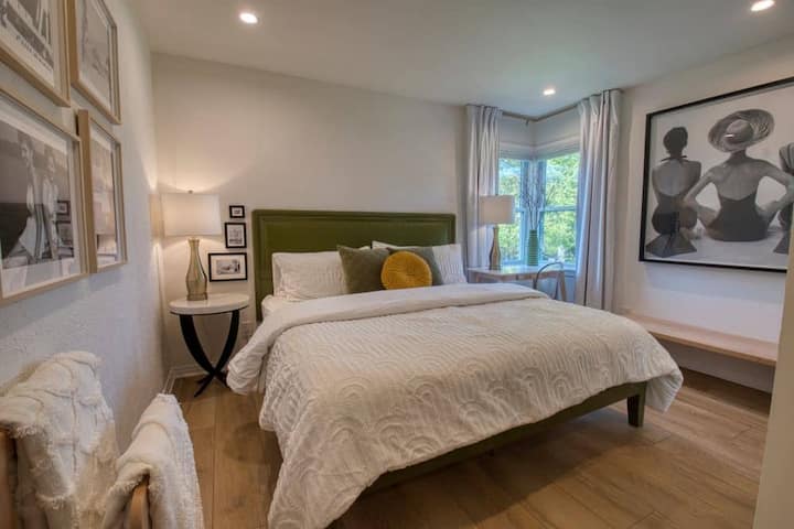 Bedroom #3, king bed with private bath.  Lakeside retro artwork adorns the walls.  Mattress is hybrid individually wrapped coil spring with memory foam top.