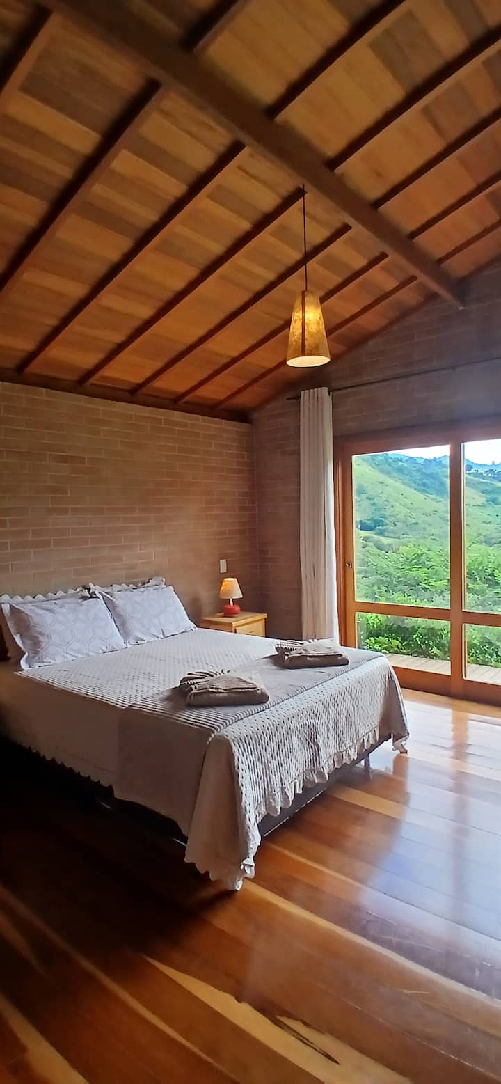 Room with queen bed 
Hot and cold air conditioning 
Mountain View