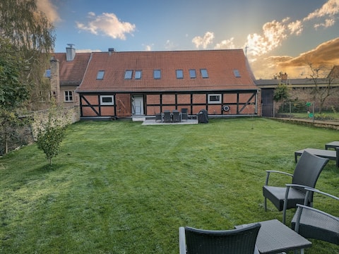 chic barn with garden in island town on the lake