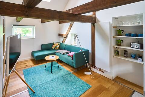 chic barn with garden in island town on the lake