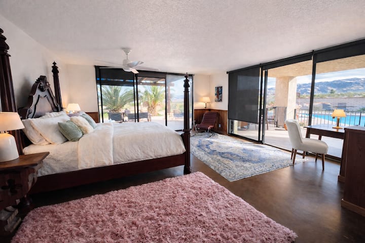 Large master bedroom that has its own wing of the house. Private patio to the spa and also pool area.