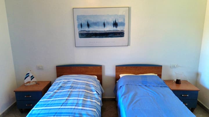 Habitación con 2 camas individuales que se pueden unir