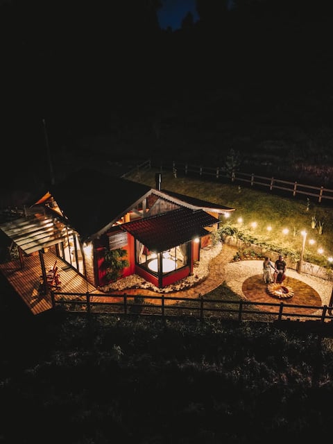 Cozy cabin, bathtub, fireplace and nature.