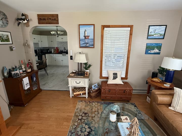 Lots of local art from Tangier Island, VA, Cambridge and Smith Island. Plenty of books on the Chesapeake Bay on the coffee table and in the book shelf.
