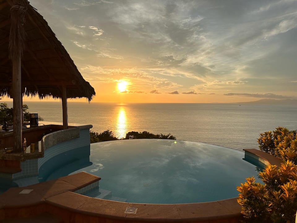 A palapa bar above Banderas Bay, Puerto Vallarta, Jalisco, Mexico, photo 9 of 10
