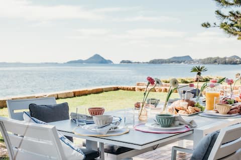 Whispering Sands  Waters Edge- Corlette